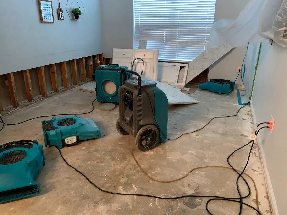 Dehumidifier in flood-cut room for Water Damage Restoration in San Martin